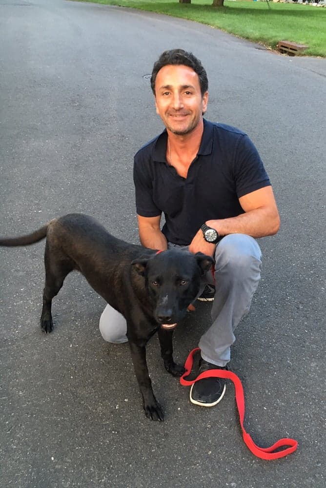 Mike Konstantaras with a dog